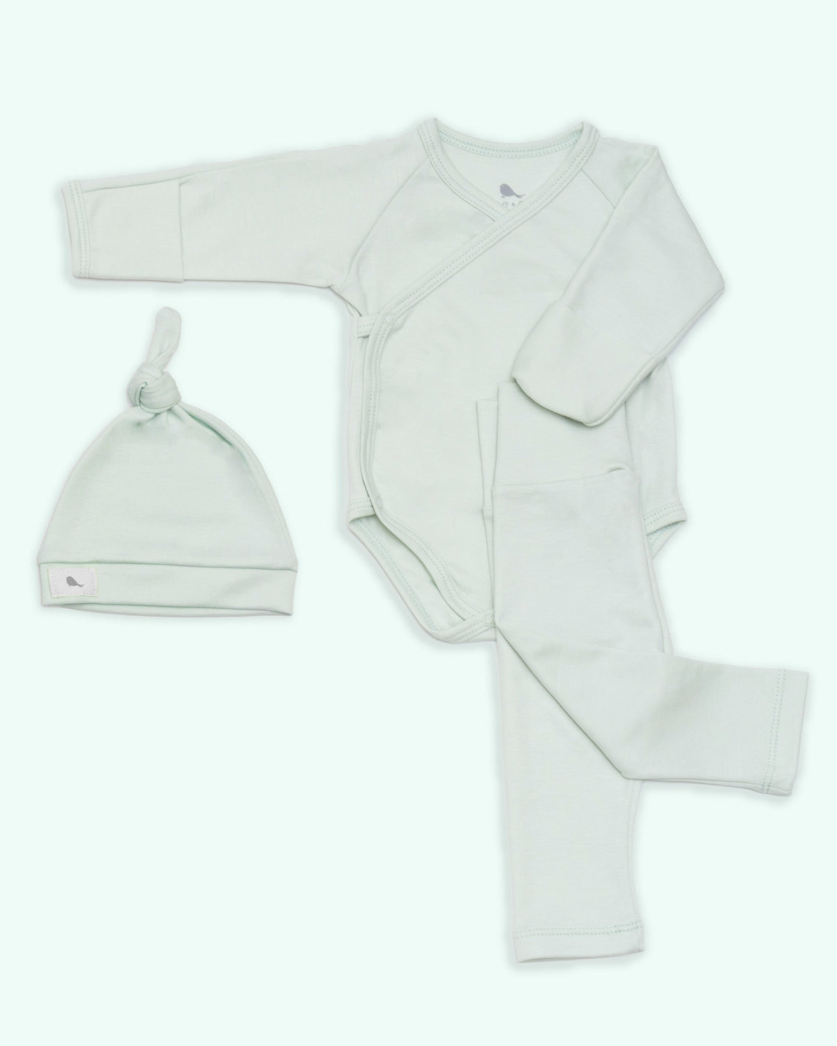 Set de ropita en menta, color neutro para bebé
