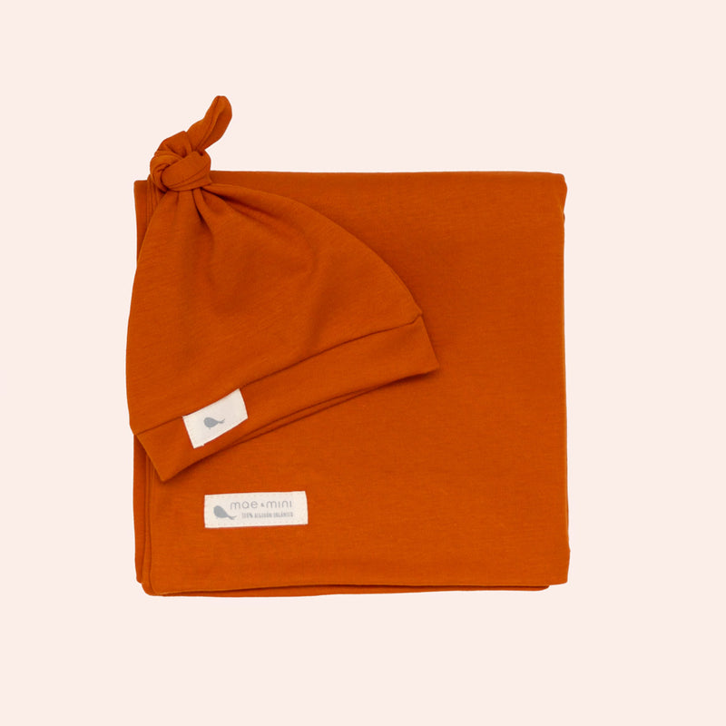 Set Arrullo en Naranja Terracota - set de regalo para bebe Mae & Mini